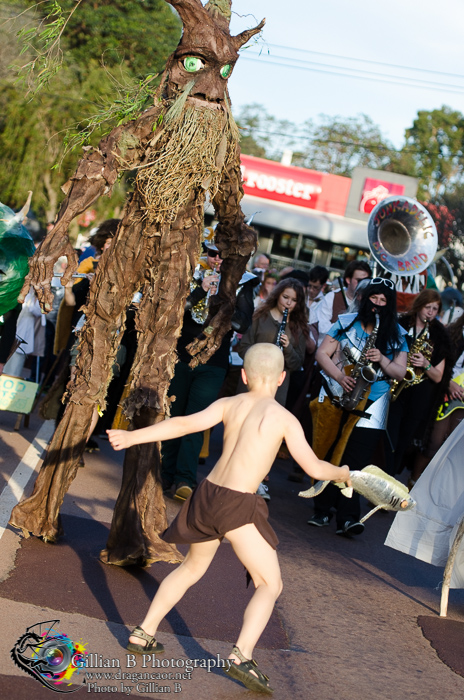 2013 Parade shot of the very tall Ent faced by Gollum with a Fish